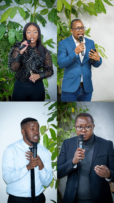 Alumi speaking at the event