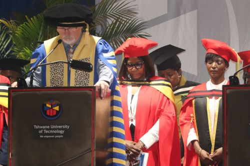 ICT Spring University officials and academic members observing a solemn
